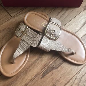 Gently used bone colored Marc Fisher sandals